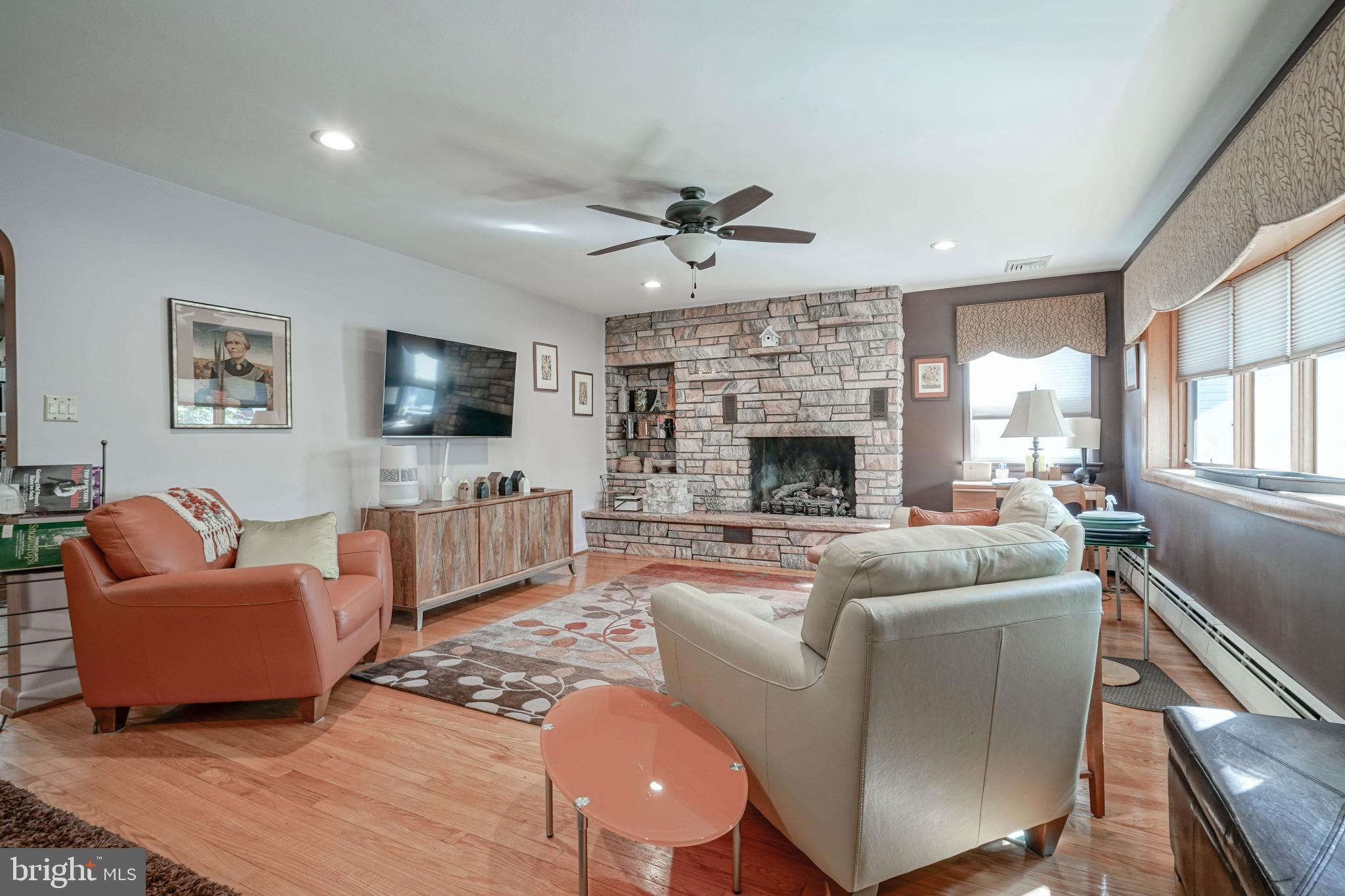 55 East Evesham Road Runnemede, NJ 08078 - Photo 3 of 45 a living room with furniture fireplace and a flat screen tv
