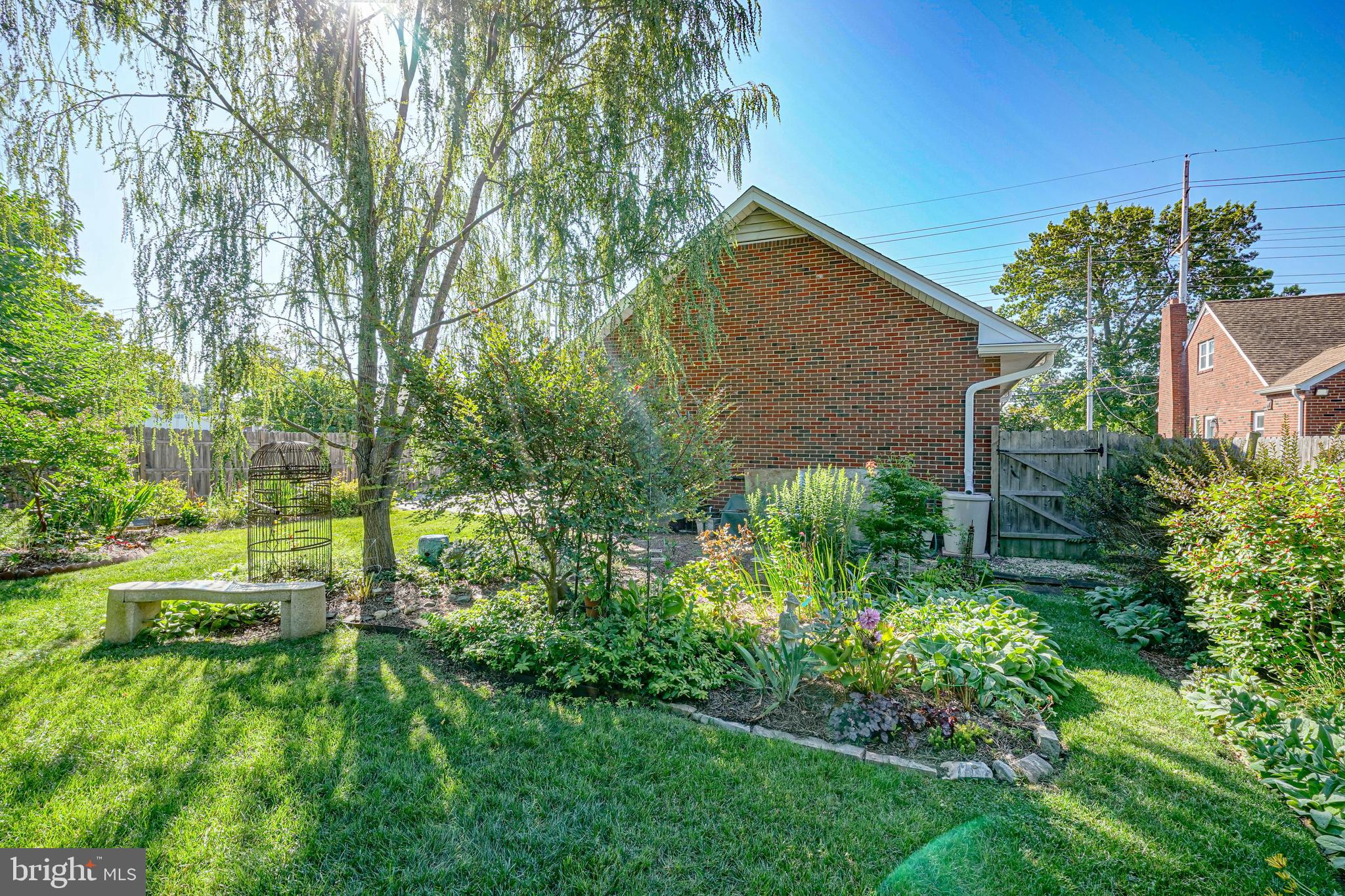 55 East Evesham Road Runnemede, NJ 08078 - Photo 40 of 45 a backyard of a house with plants and large trees