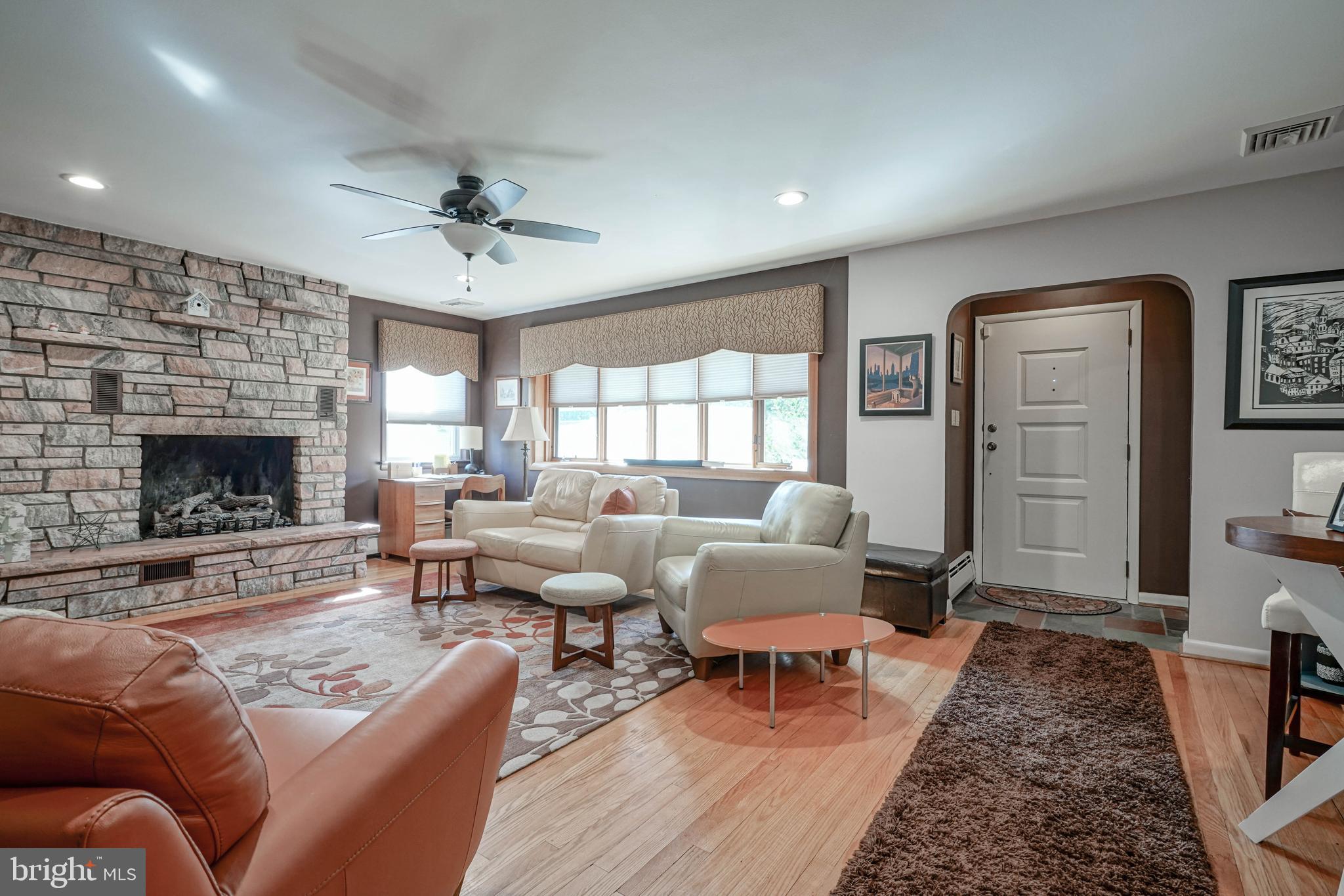 55 East Evesham Road Runnemede, NJ 08078 - Photo 5 of 45 a living room with furniture and a fireplace