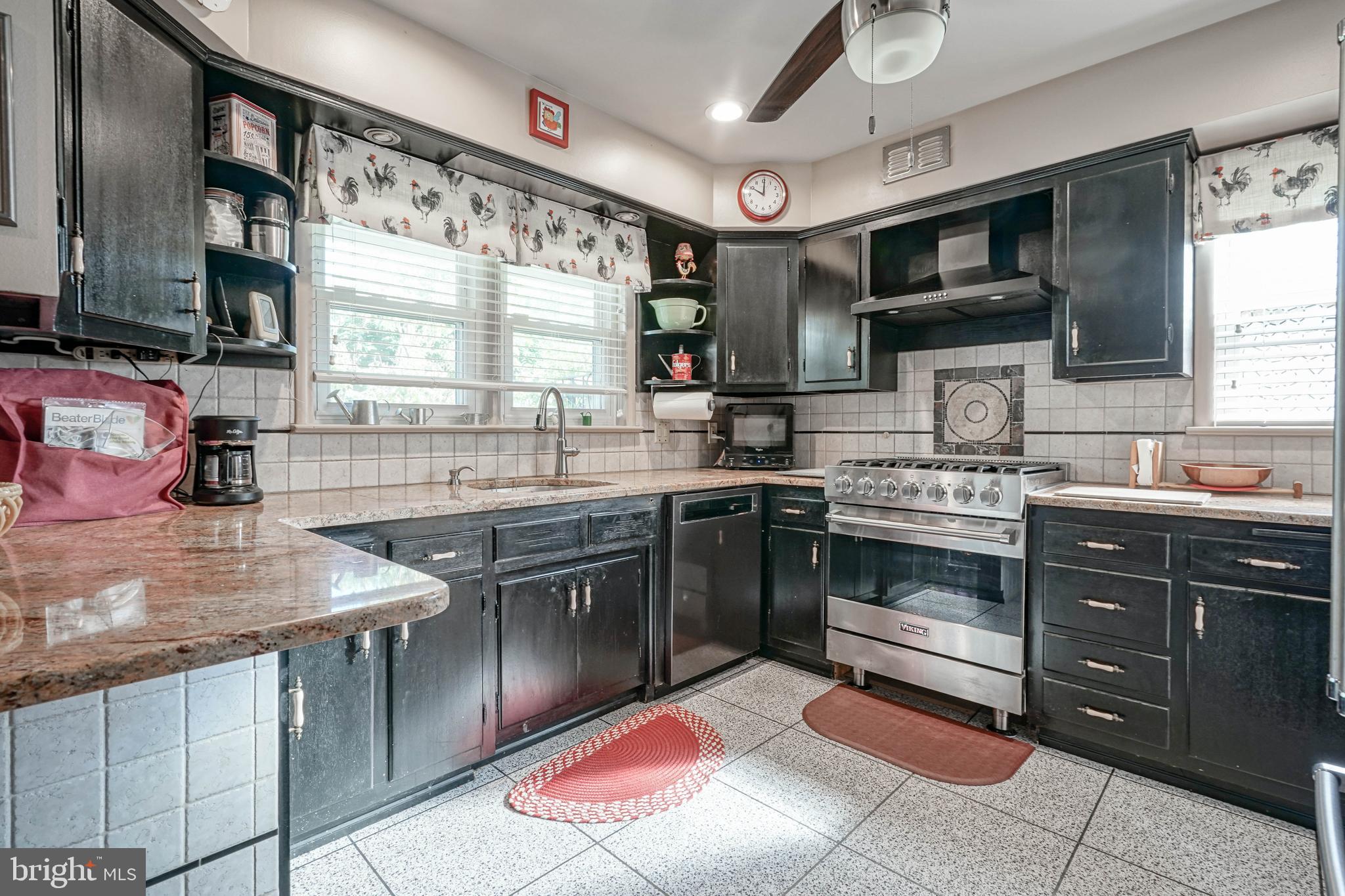 55 East Evesham Road Runnemede, NJ 08078 - Photo 9 of 45 a kitchen with a sink stove and microwave
