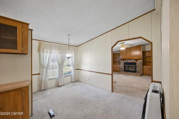 a view of a livingroom with a staircase