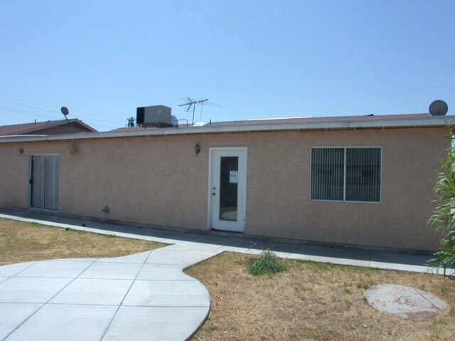 128 North Signal Butte Road Apache Junction, AZ 85120 - Photo 5 of 6 a view of a house with backyard