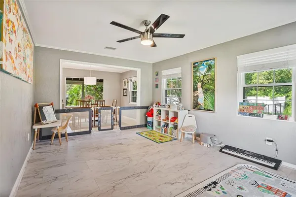 a living room with furniture and window