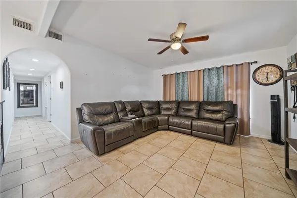 a living room with furniture and a window