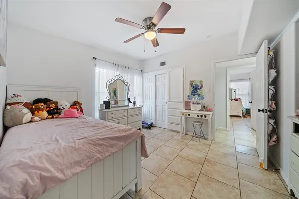 a living room with furniture and white walls