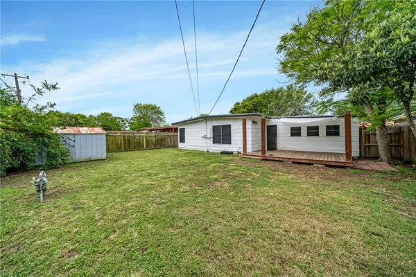 a house view with a garden space