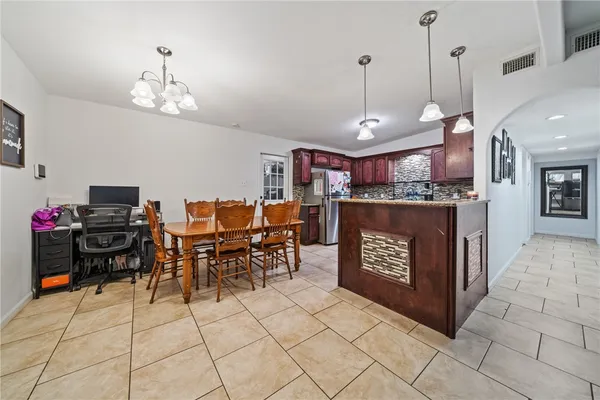 a view of a dining room with furniture