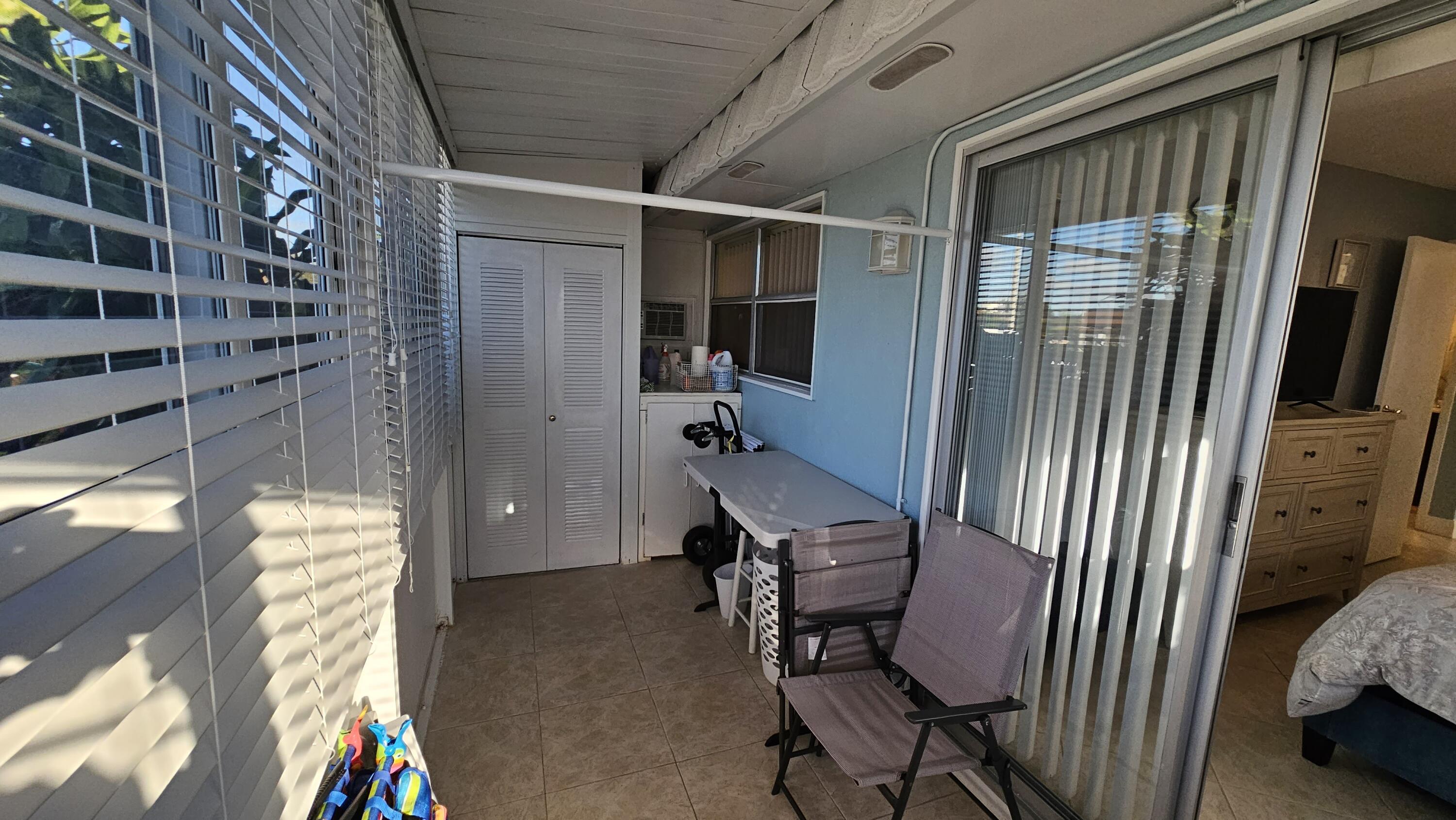 256 Seville K Delray Beach, FL 33446 - Photo 17 of 45 a view of chair and utility room