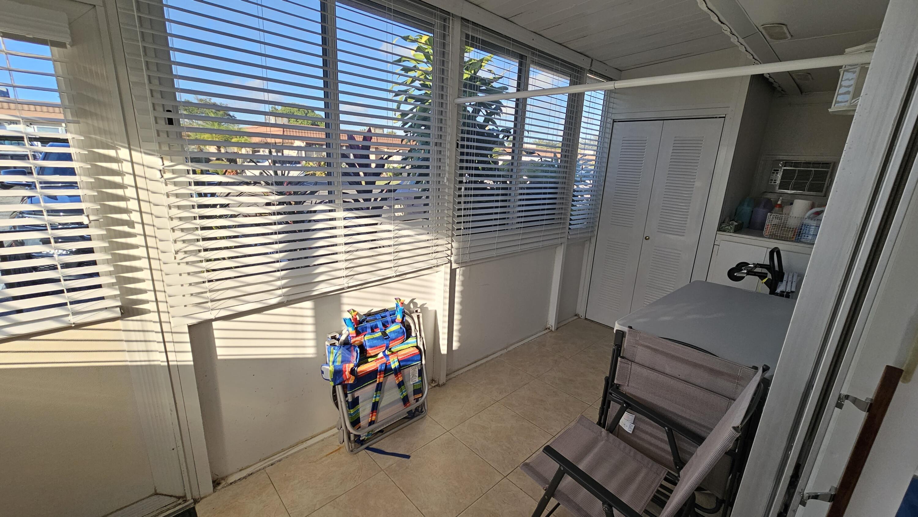 256 Seville K Delray Beach, FL 33446 - Photo 18 of 45 a view of deck and patio