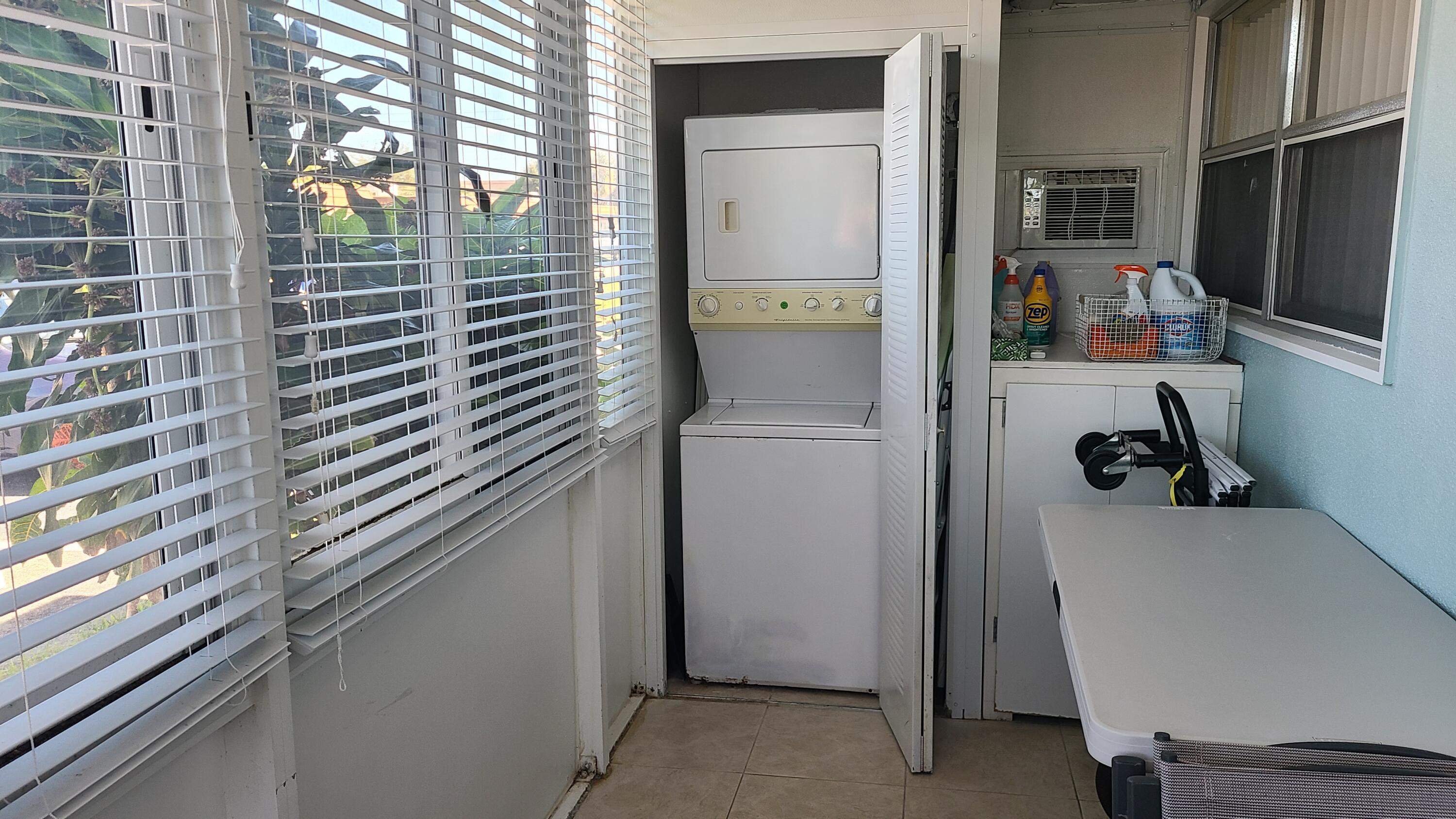 256 Seville K Delray Beach, FL 33446 - Photo 19 of 45 a room with storage and utility