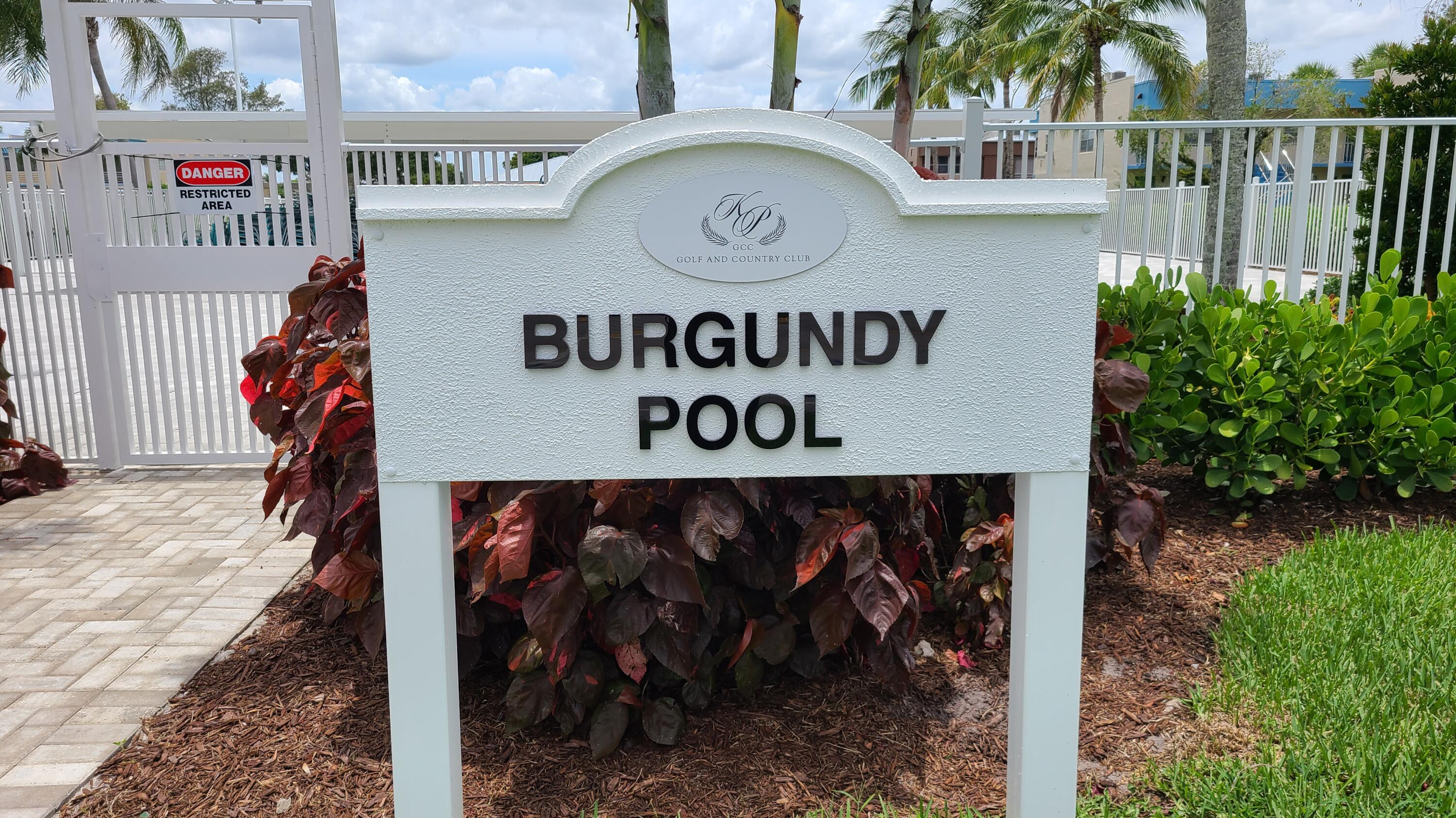 256 Seville K Delray Beach, FL 33446 - Photo 34 of 45 a view of a sign under a book