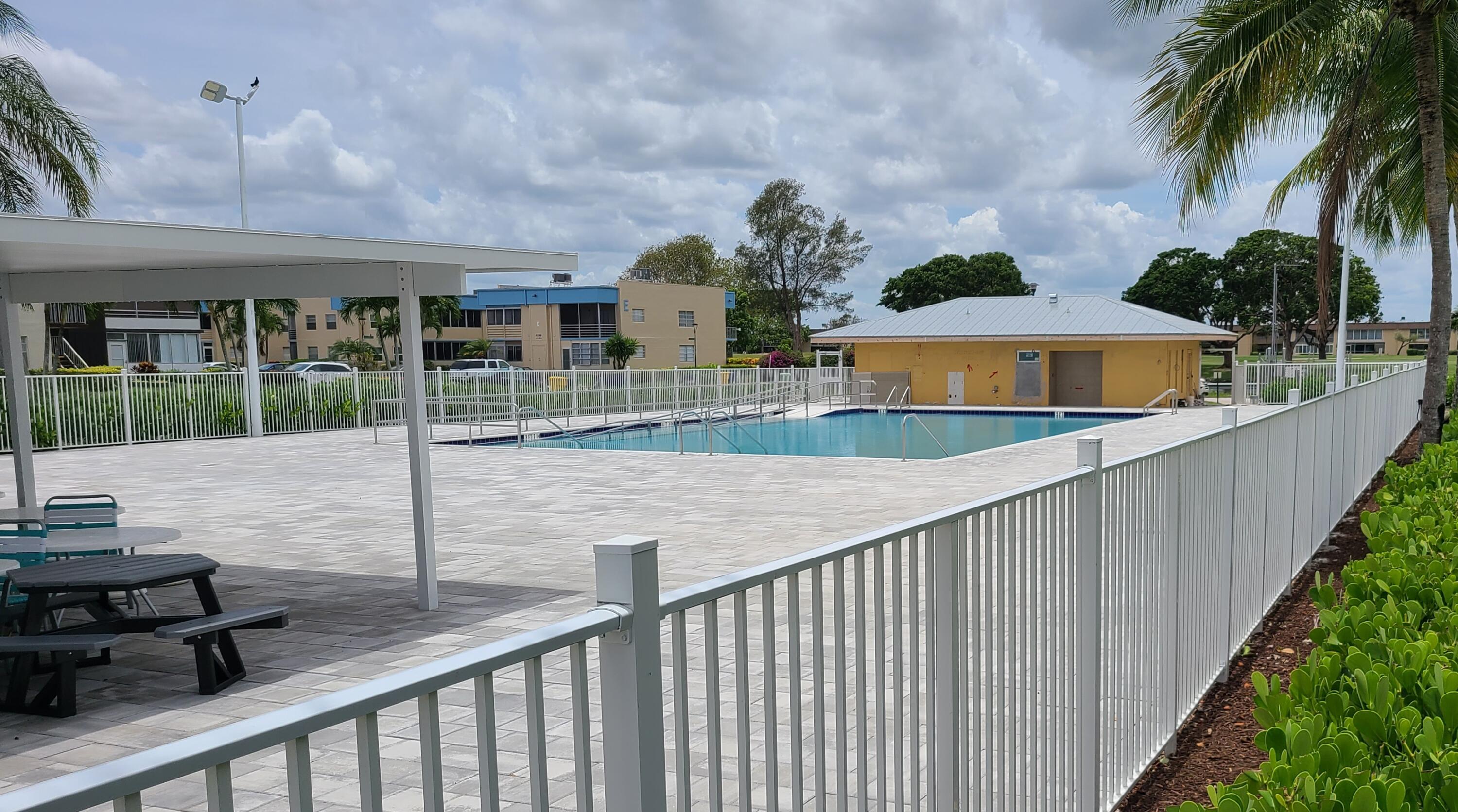 256 Seville K Delray Beach, FL 33446 - Photo 36 of 45 a view of a house with a porch