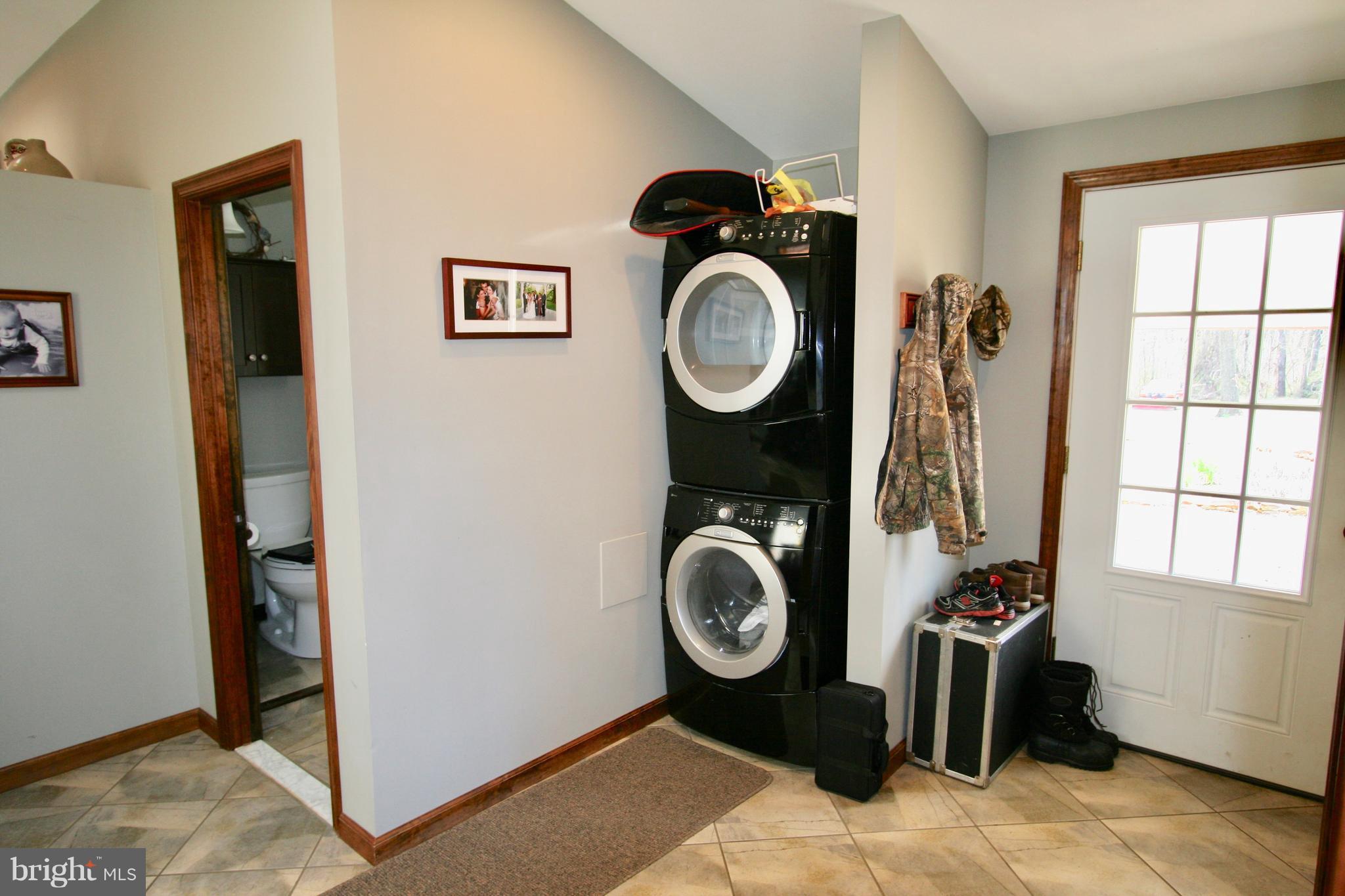 144 Reservoir Road Perryville, MD 21903 - Photo 26 of 30 front loaded washier in dryer in mud room