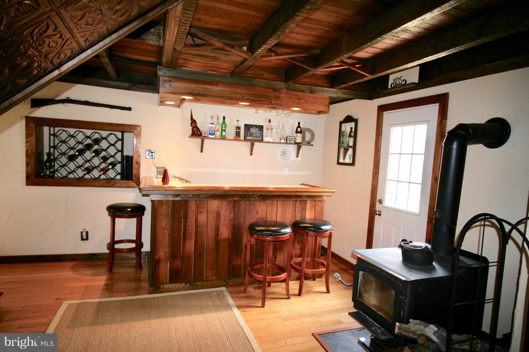 144 Reservoir Road Perryville, MD 21903 - Photo 10 of 30 Bar and entertaining with wood burning stove