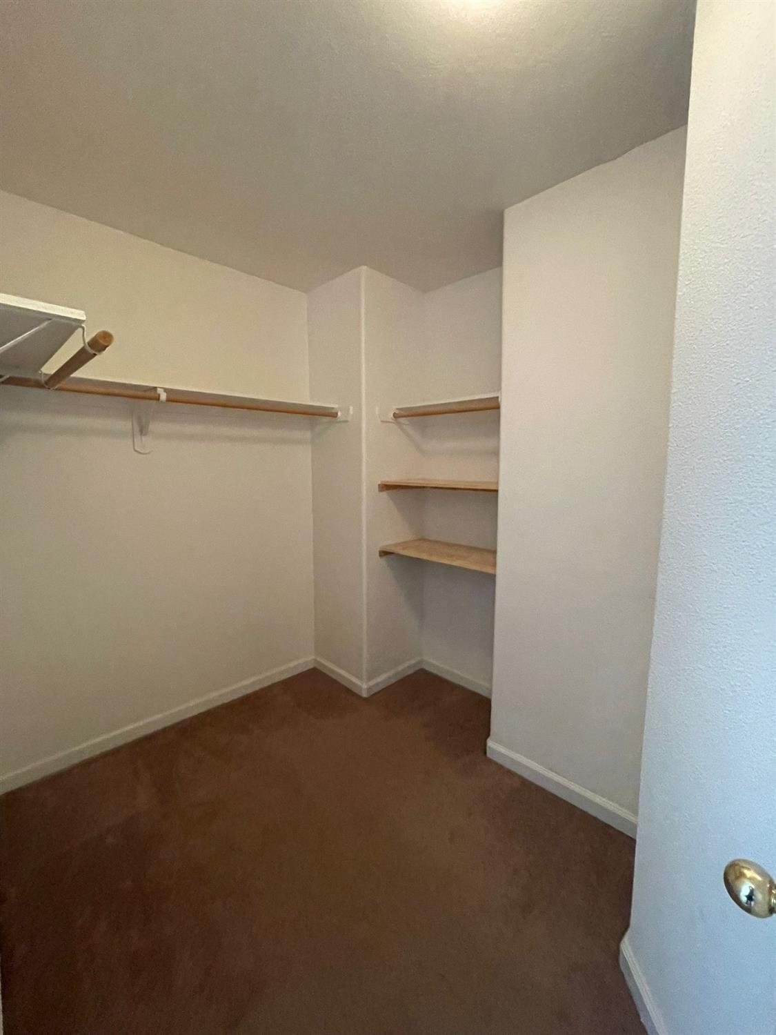 3123 Burgan Avenue Clovis, CA 93611 - Photo 14 of 26 a view of an empty walk in closet