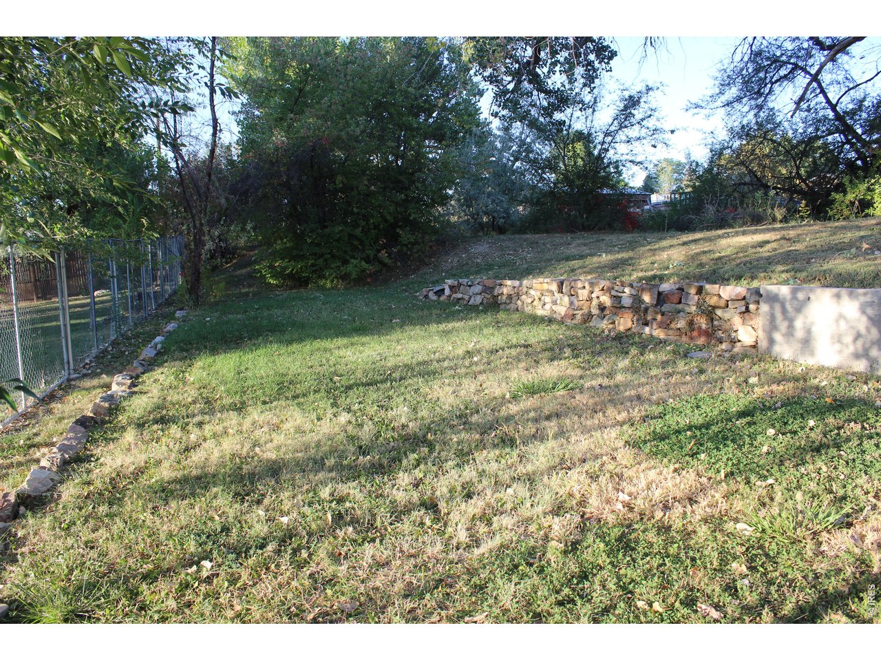 108 East Douglas Road Fort Collins, CO 80524 - Photo 34 of 38 Prior picture of lower garden area
