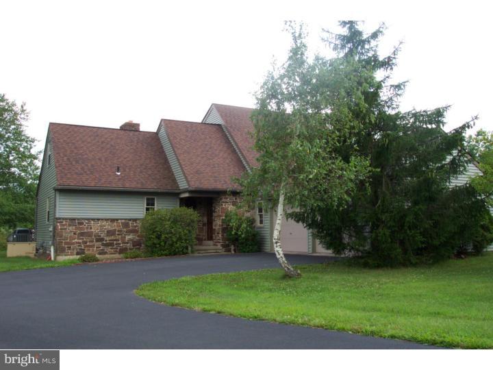 1249 Mink Road Perkasie, PA 18944 - Photo 1 of 18 a view of a house with a yard