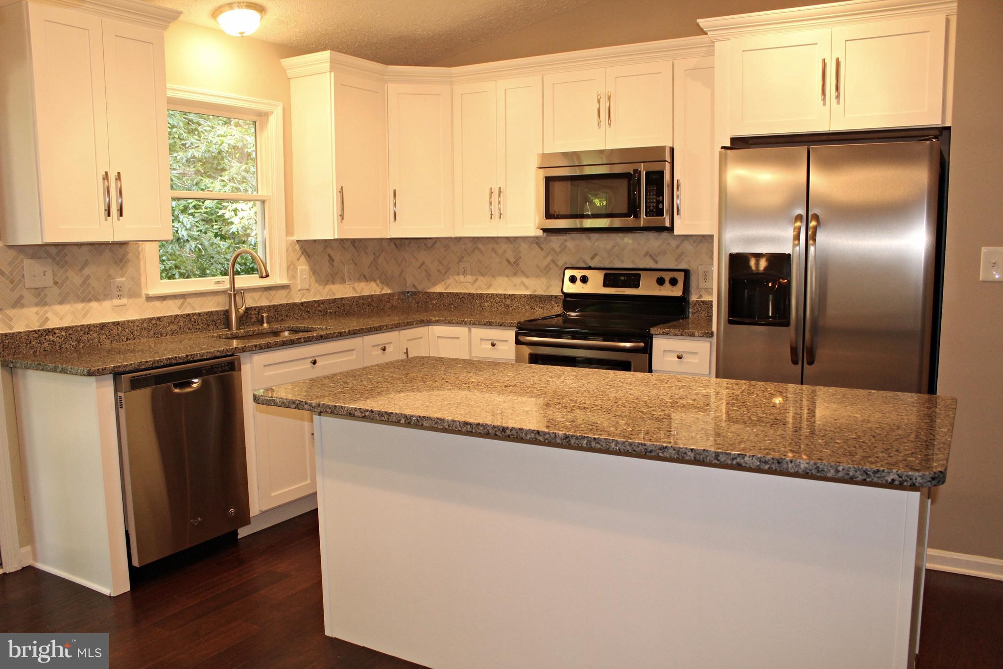 668 San Gabriel Road Lusby, MD 20657 - Photo 3 of 28 New Kitchen with Granite & Stainless Steel!