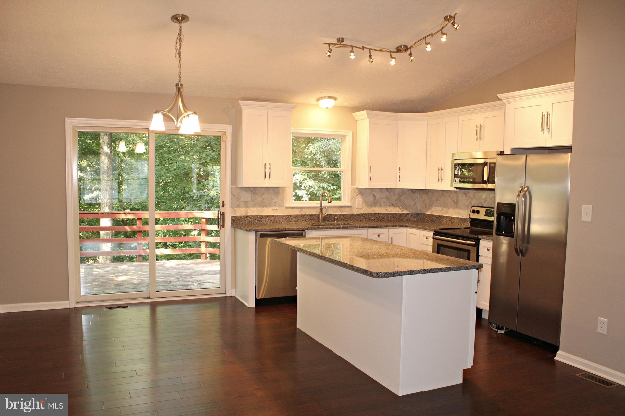 668 San Gabriel Road Lusby, MD 20657 - Photo 4 of 28 New Kitchen with Granite & Stainless Steel!