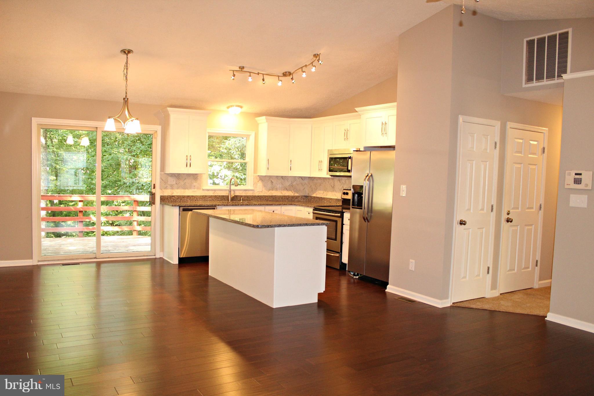668 San Gabriel Road Lusby, MD 20657 - Photo 27 of 28 Open Floor Plan with Wood Flooring!