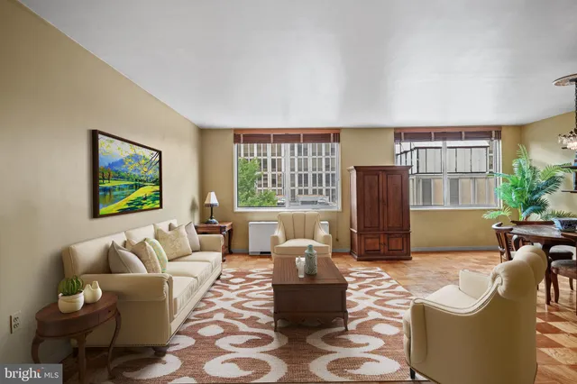 a living room with furniture and a window