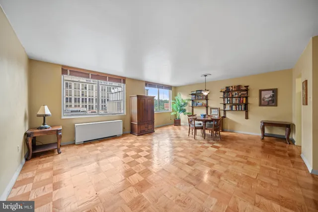a view of a livingroom with furniture and a window