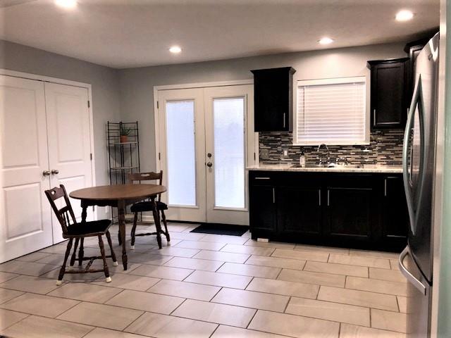 1801 Mosley Ferry Road Chapmansboro, TN 37035 - Photo 11 of 24 Great space for an eat in kitchen! The laundry area is convenient and there is a large pantry as well.