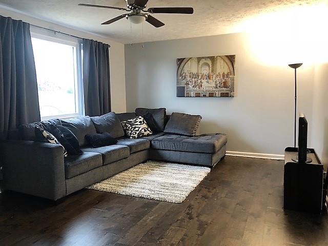 Spacious living room with a large picture window