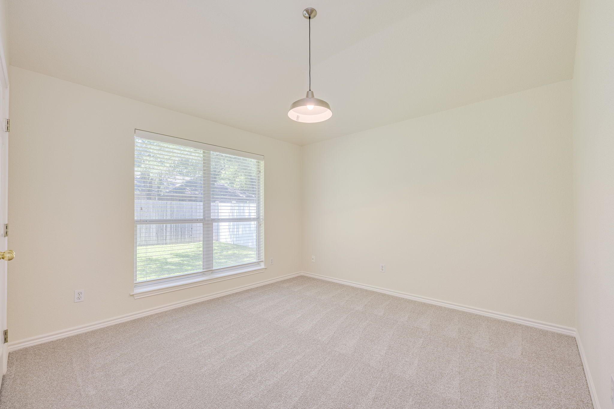 111 Arrowhead Lane Georgetown, TX 78628 - Photo 32 of 40 an empty room with windows