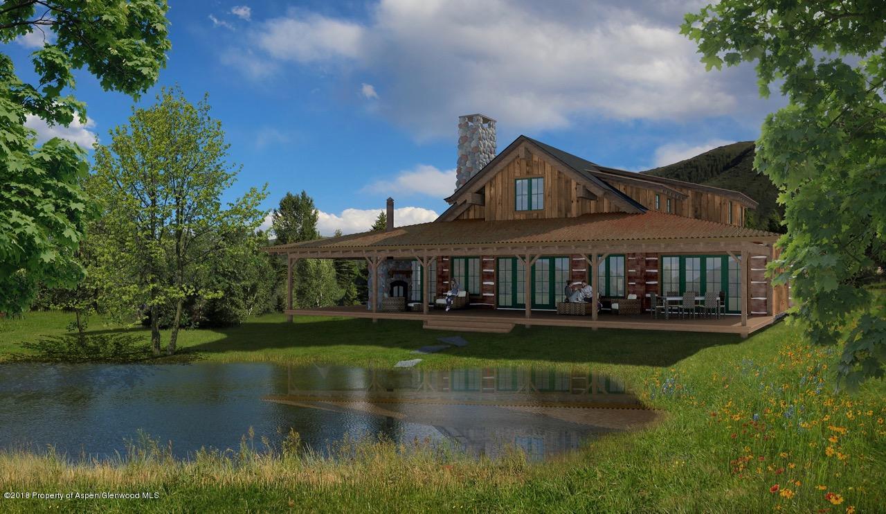 53 Damselfly Lane Basalt, CO 81621 - Photo 1 of 1 a front view of a house with a lake view