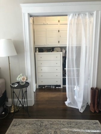 66 Queensberry Street, Unit 416 Boston, MA 02215 - Photo 12 of 18 a view of a door and chair in a room