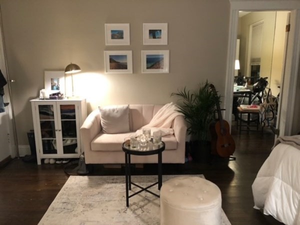 66 Queensberry Street, Unit 416 Boston, MA 02215 - Photo 3 of 18 a living room with furniture and wooden floor
