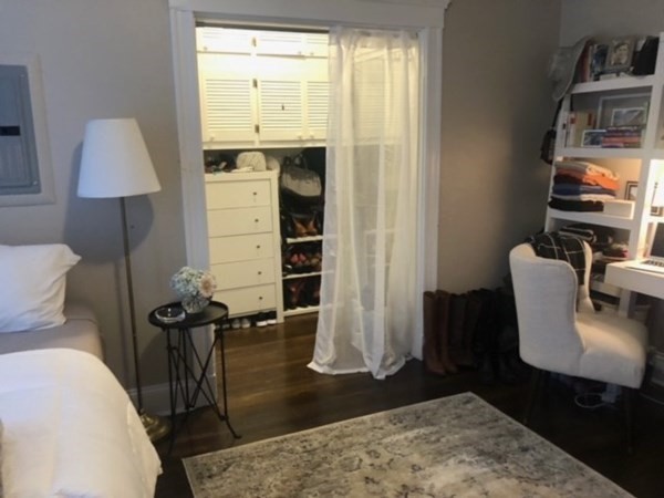 66 Queensberry Street, Unit 416 Boston, MA 02215 - Photo 5 of 18 a living room with furniture a window and a lamp