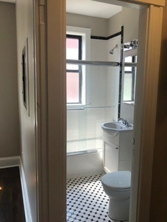 66 Queensberry Street, Unit 416 Boston, MA 02215 - Photo 10 of 18 a bathroom with a sink and a toilet