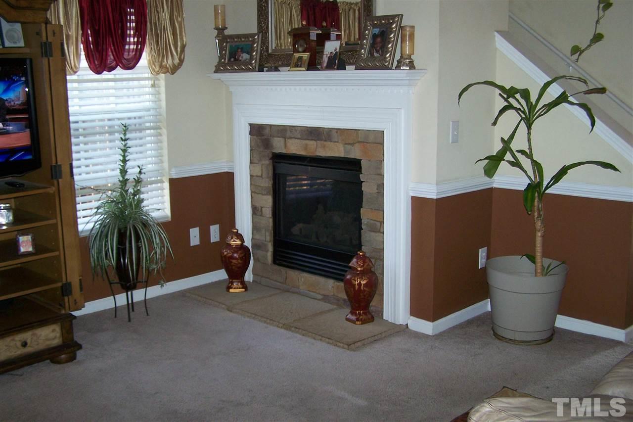 3631 Willano Way Raleigh, NC 27610 - Photo 3 of 6 cozy fireplace on a winters eve