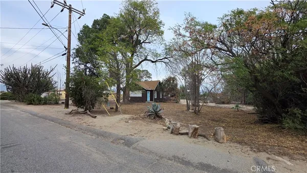 a house with trees in front of it