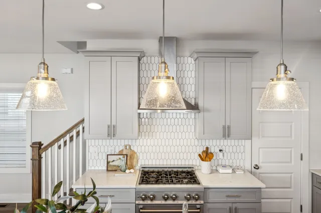 a bathroom with a double vanity sink mirror and