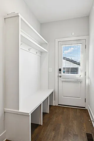 a view of a wooden balcony with a swing