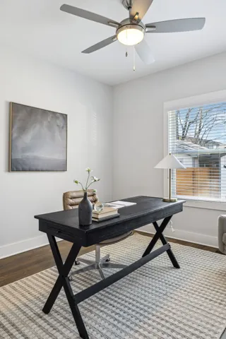 a view of a balcony with wooden floor