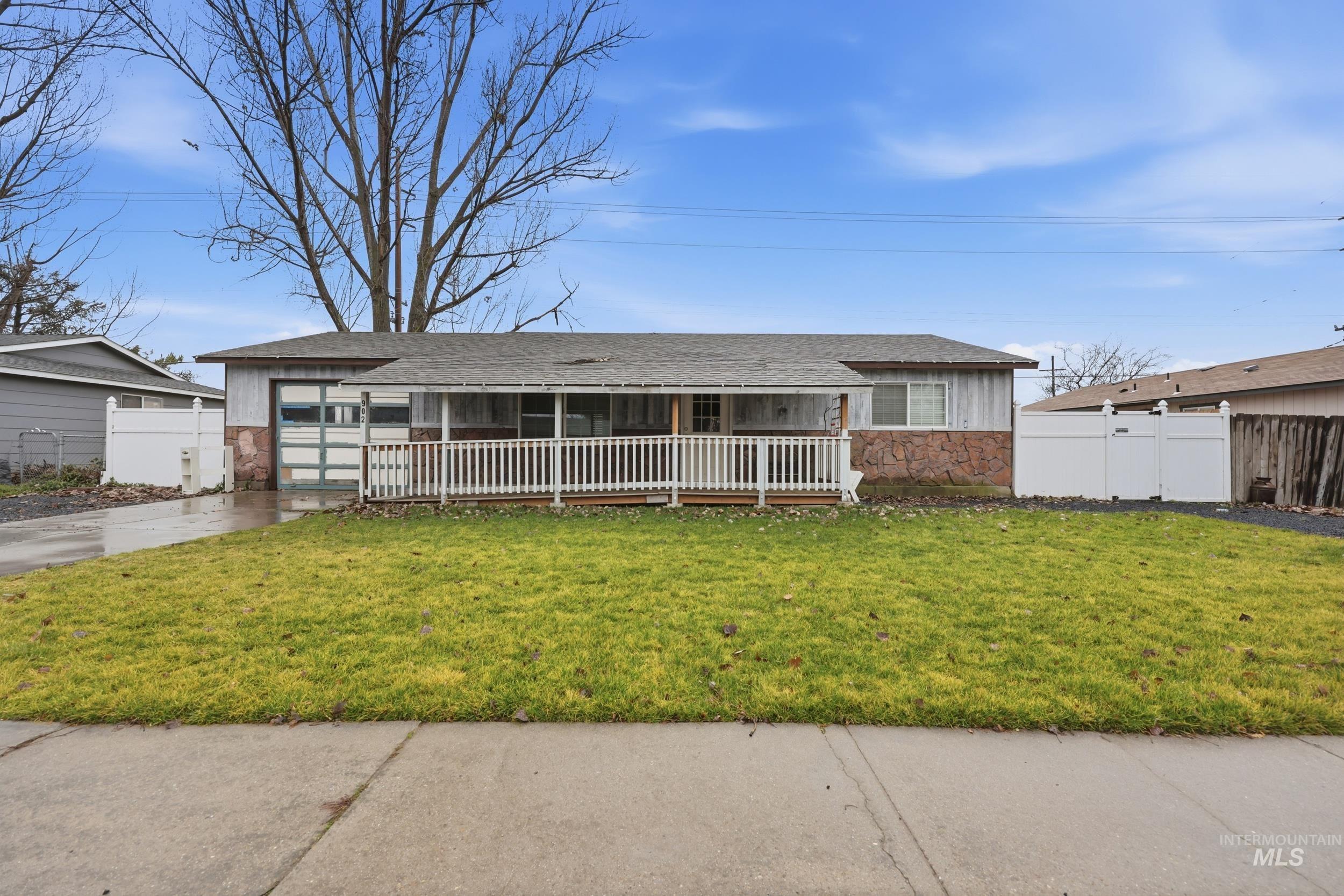 902 Harmon Way Middleton, ID 83644 - Photo 1 of 1 Ranch-style home featuring a shingled roof and driveway