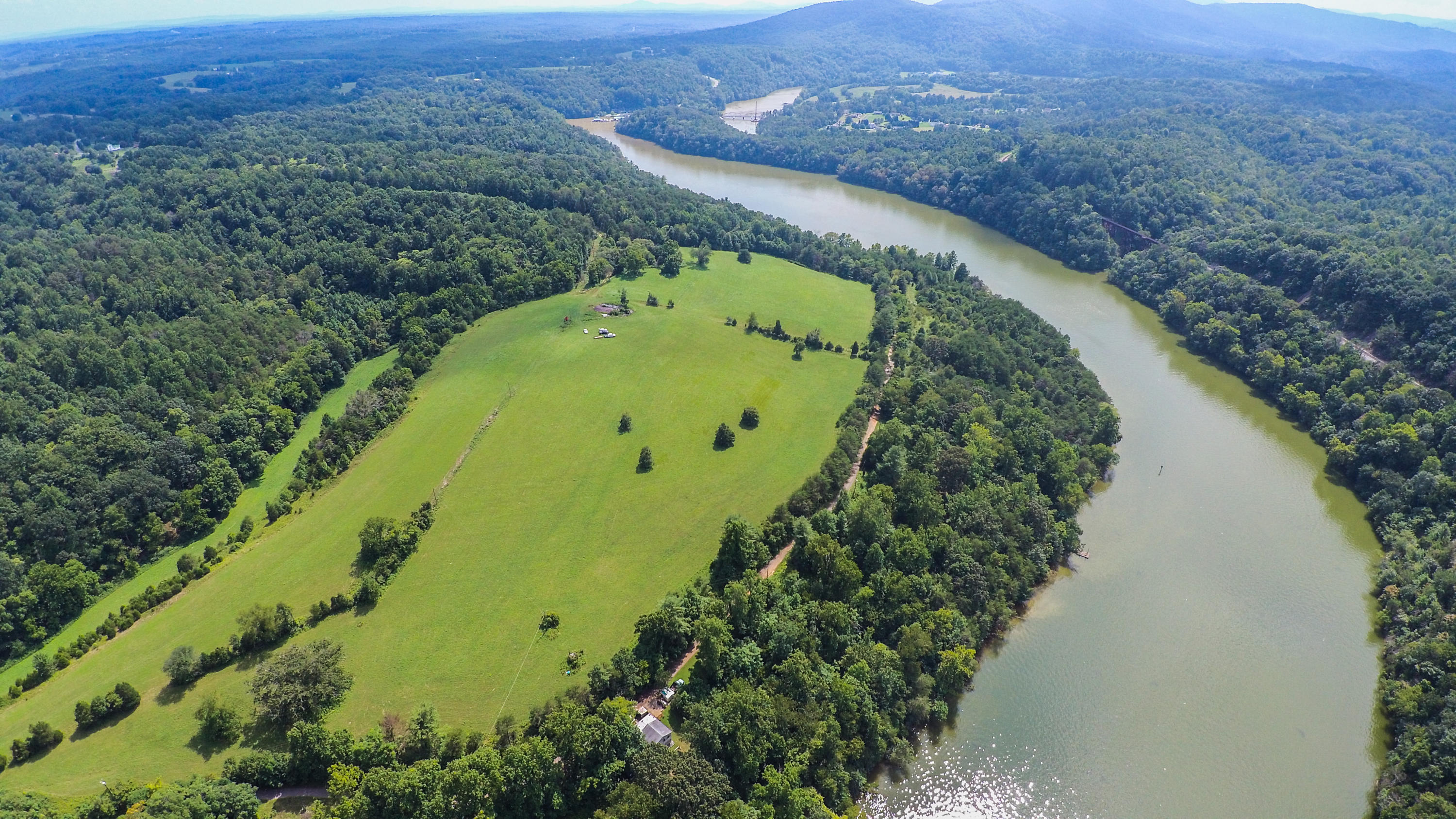 0 Moorman Road Hardy, VA 24101 - Photo 8 of 12 an aerial view of a house with a yard and lake view