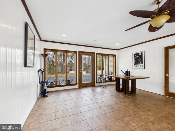 a bathroom with a sink a mirror and shower