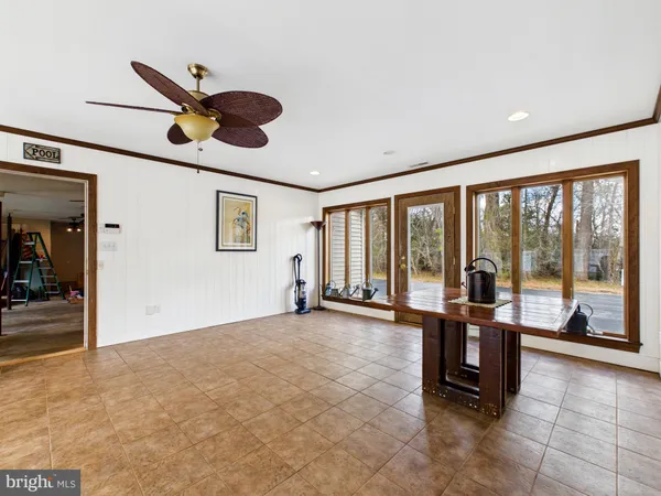 a view of a room with closet and wooden floor