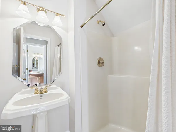 a kitchen with stainless steel appliances granite countertop a refrigerator and a stove