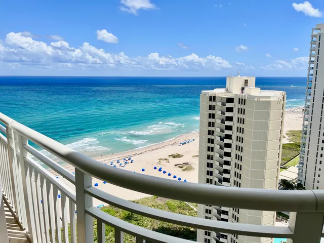a view of a balcony with an outdoor space