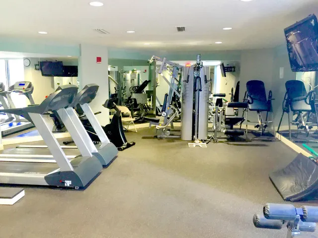 a view of a lobby with black carpet