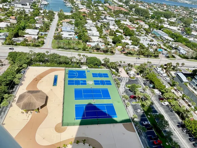 a dining table with chairs and window