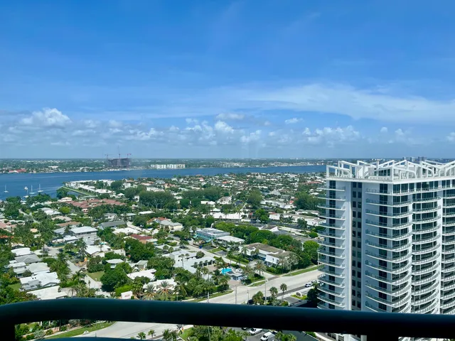 a view of city with tall buildings