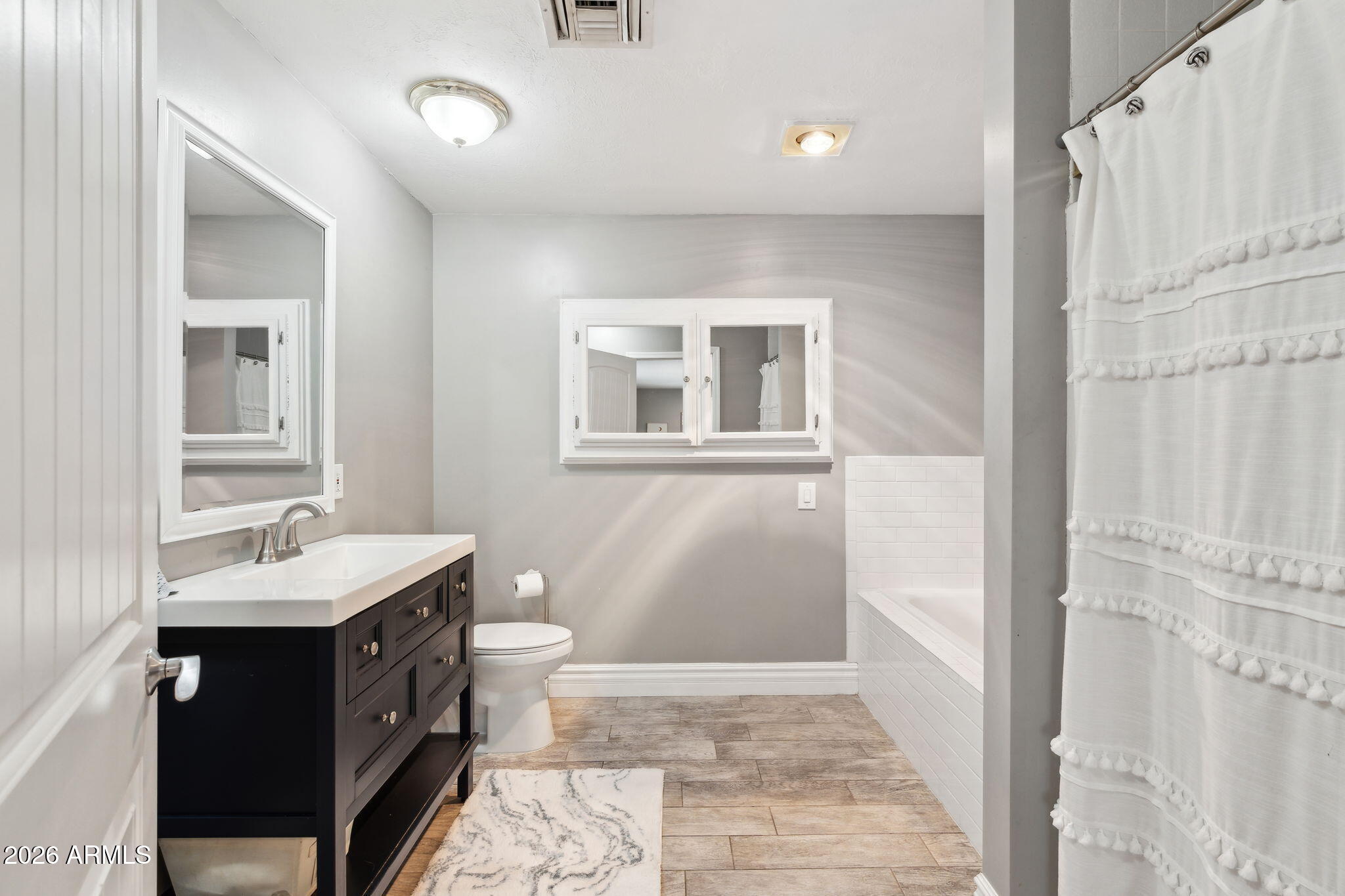 5339 East Osborn Road Phoenix, AZ 85018 - Photo 6 of 44 Family Room Bathroom