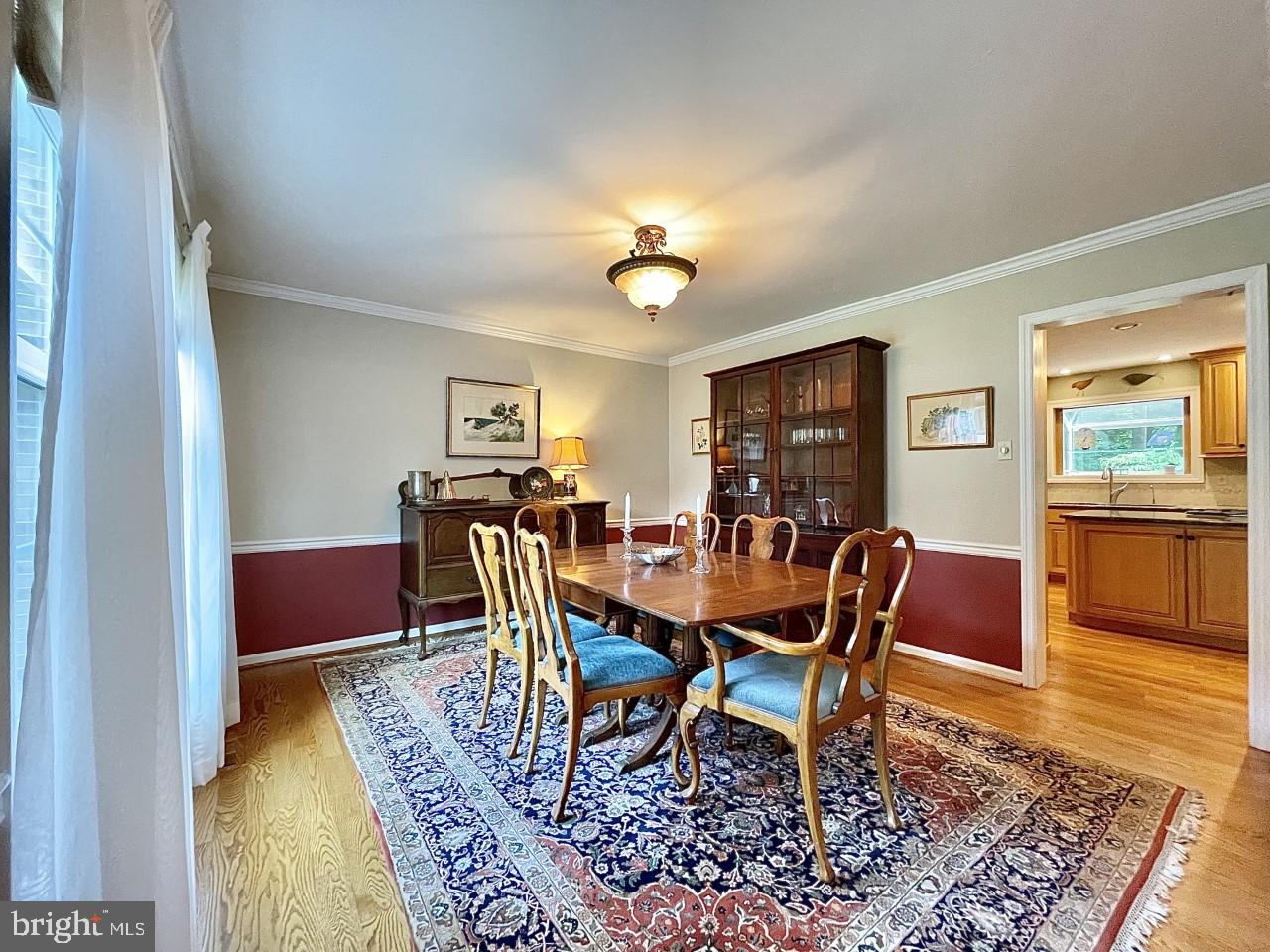 26 Raphael Road Hockessin, DE 19707 - Photo 12 of 28 Formal Dining Room with Crown Molding & Chair Rail